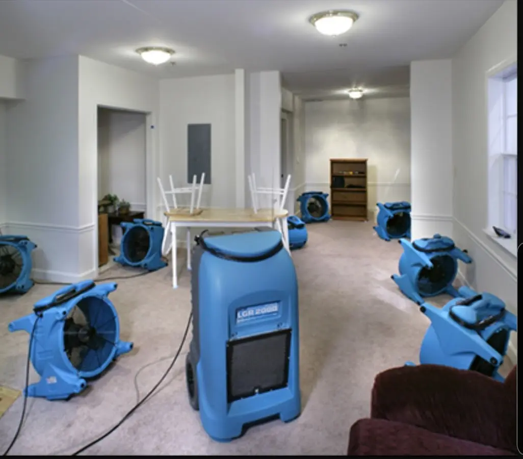 Air movers and dehumidifier setup for Water Damage Restoration in La Homa